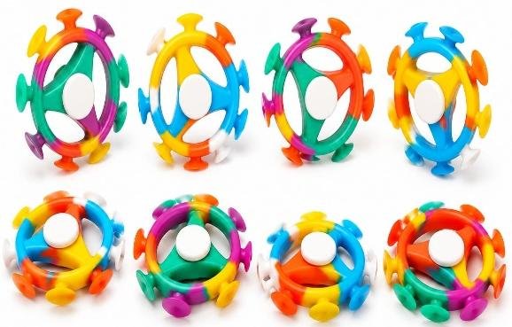 SPINNER CIRCULAR CON CHUPONES